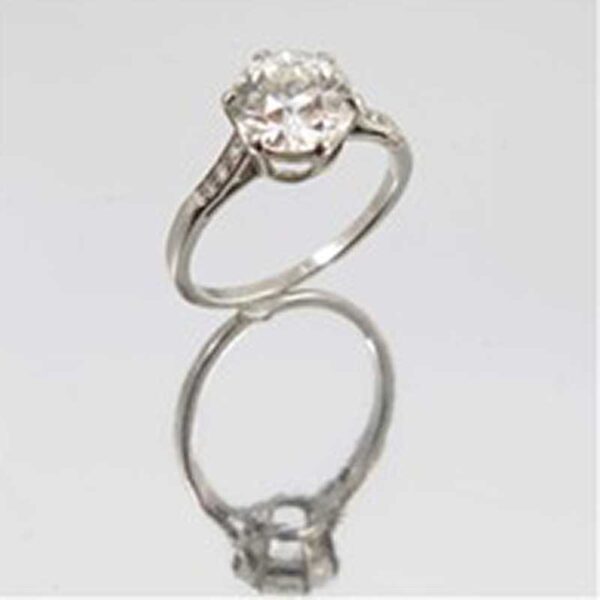An early 20th century, single stone old brilliant cut diamond hand constructed ring