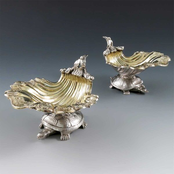 A pair of George III silver and gilt shell sweetmeat dishes