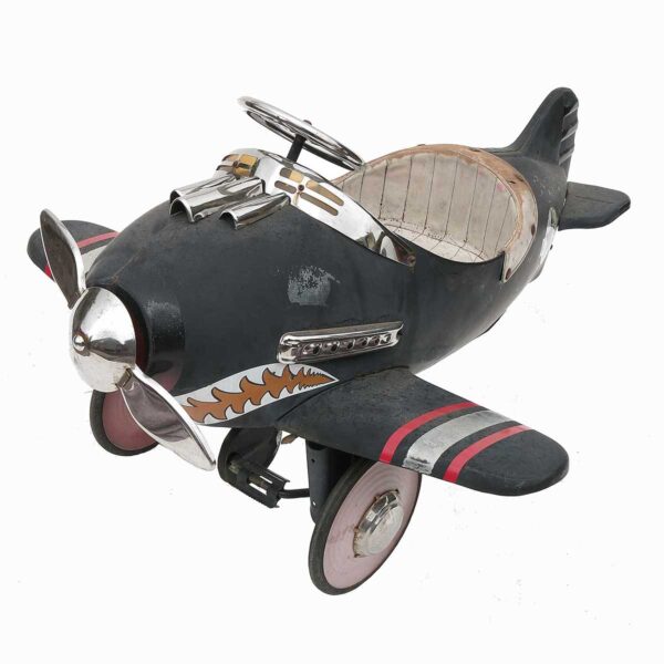 A child's pedal toy aeroplane