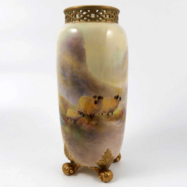 A Royal Worcester spill vase, decorated with sheep by a loch in a Highland landscape by Harry Davis