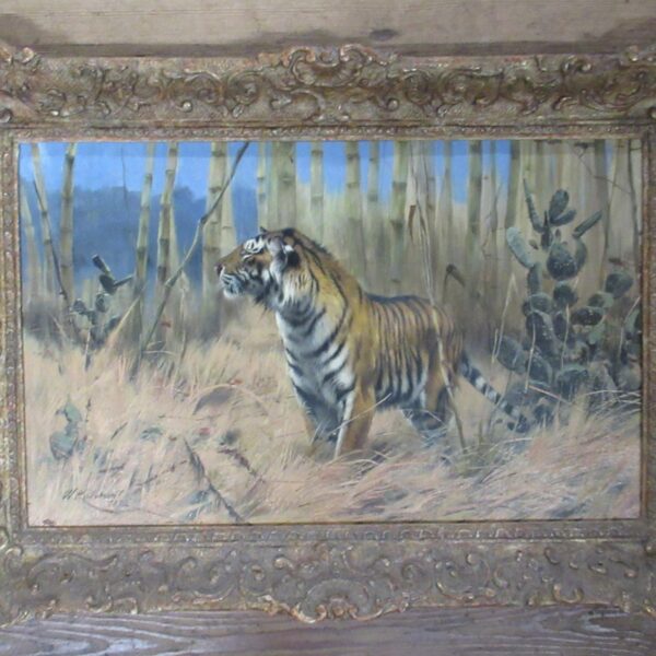 Wilhelm Kuhnert (1865-1926), oil on panel, Tiger emerging from the undergrowth, signed and dated 1890