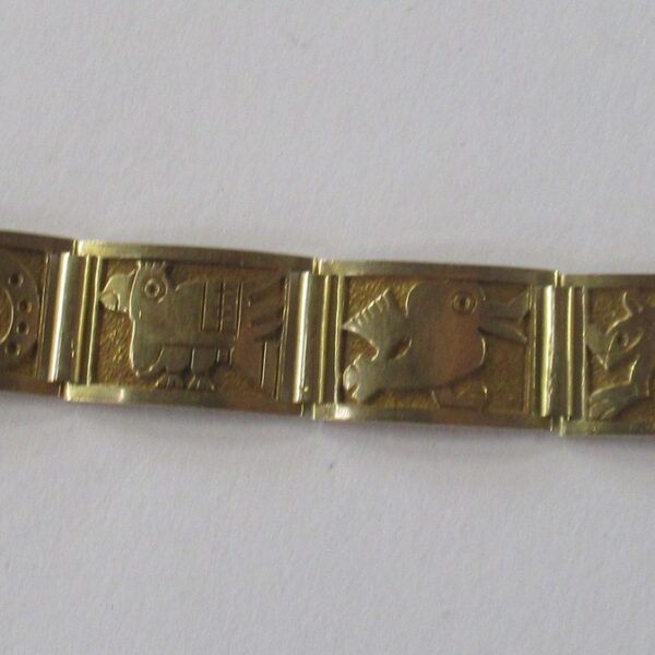 An 18k yellow gold Mexican bracelet, of eight rectangular links cast with creatures of Aztec style