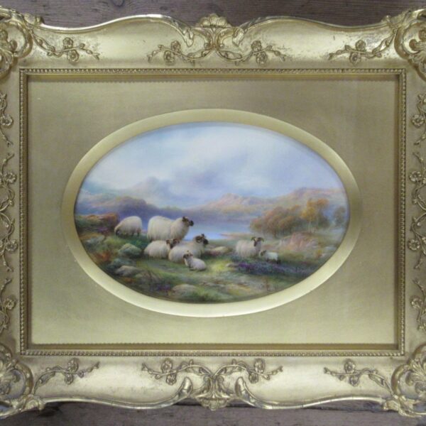 A Royal Worcester oval porcelain plaque, finely painted with sheep in a moorland by Davis